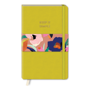 Yellow softcover journal for capturing thoughts, travel stories, and dreams.