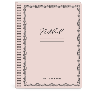 Blush-colored semi-concealed notebook for jotting down thoughts and plans.